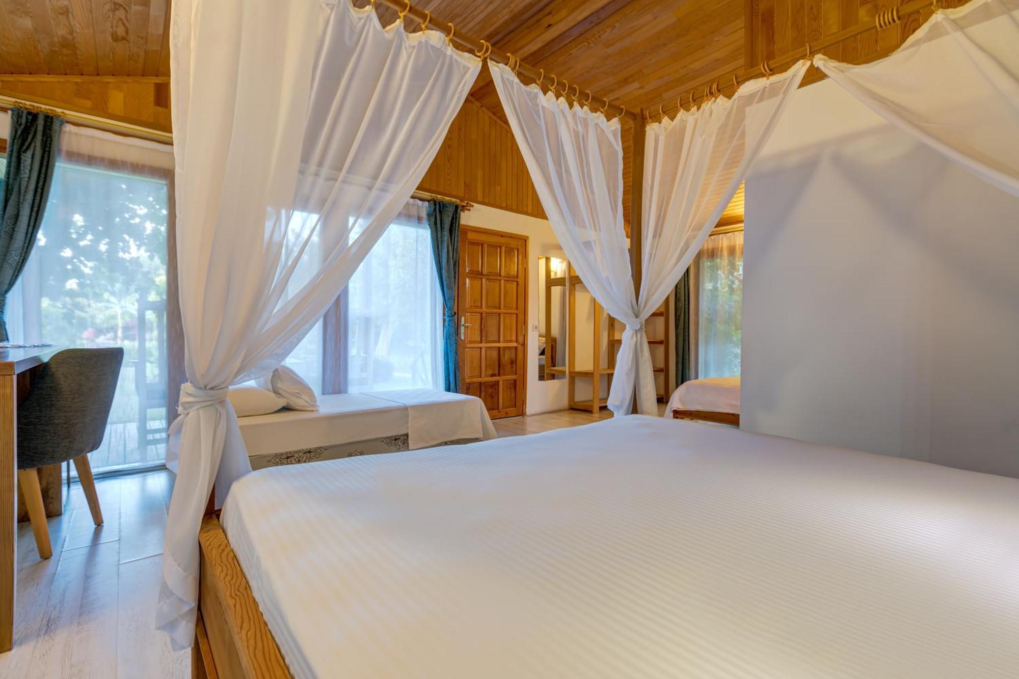 Etenna Beach Bungalows Чирали Экстерьер фото
